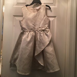 Beautiful gold dress with ruffle and bow